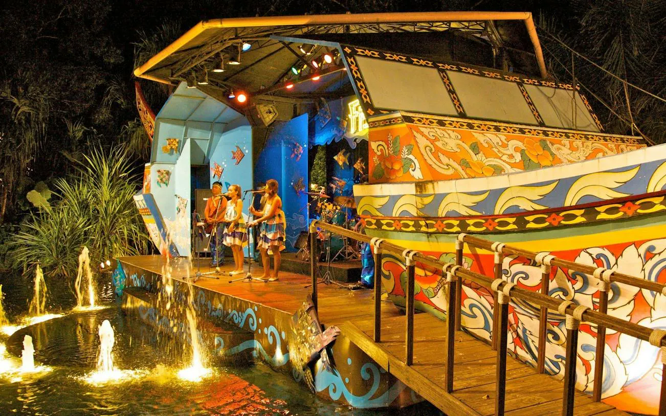 Musicians performing on a colorful stage at Phuket FantaSea Show, Phuket.