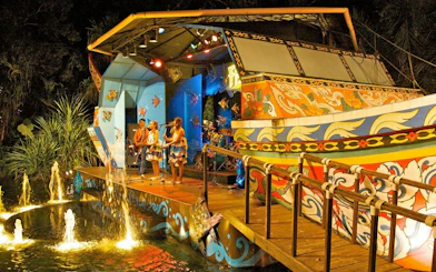 Musicians performing on a colorful stage at Phuket FantaSea Show, Phuket.