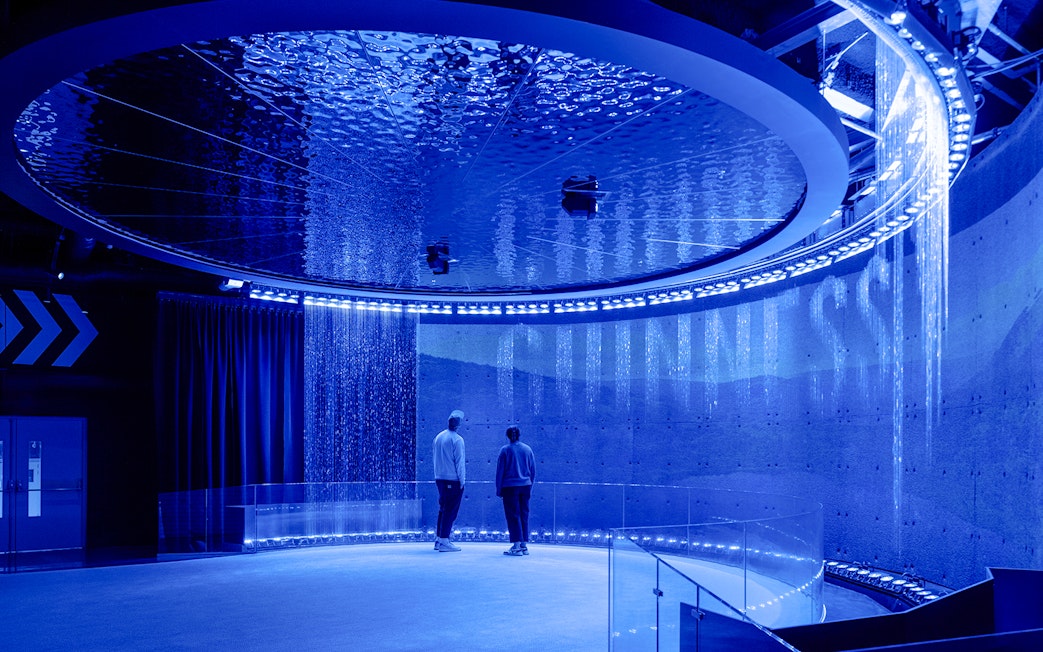 Guests exploring interactive exhibits inside the Guinness Storehouse.