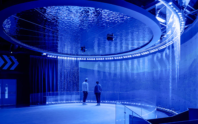 Guests exploring interactive exhibits inside the Guinness Storehouse.
