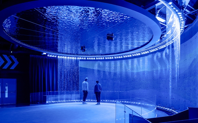 Guests exploring interactive exhibits inside the Guinness Storehouse.