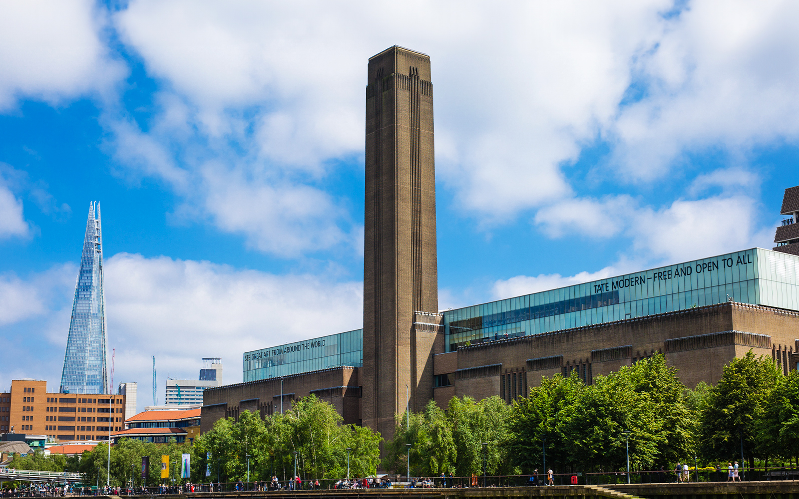 Tate Modern and Shard viewed from Thames Sightseeing Cruise in London.