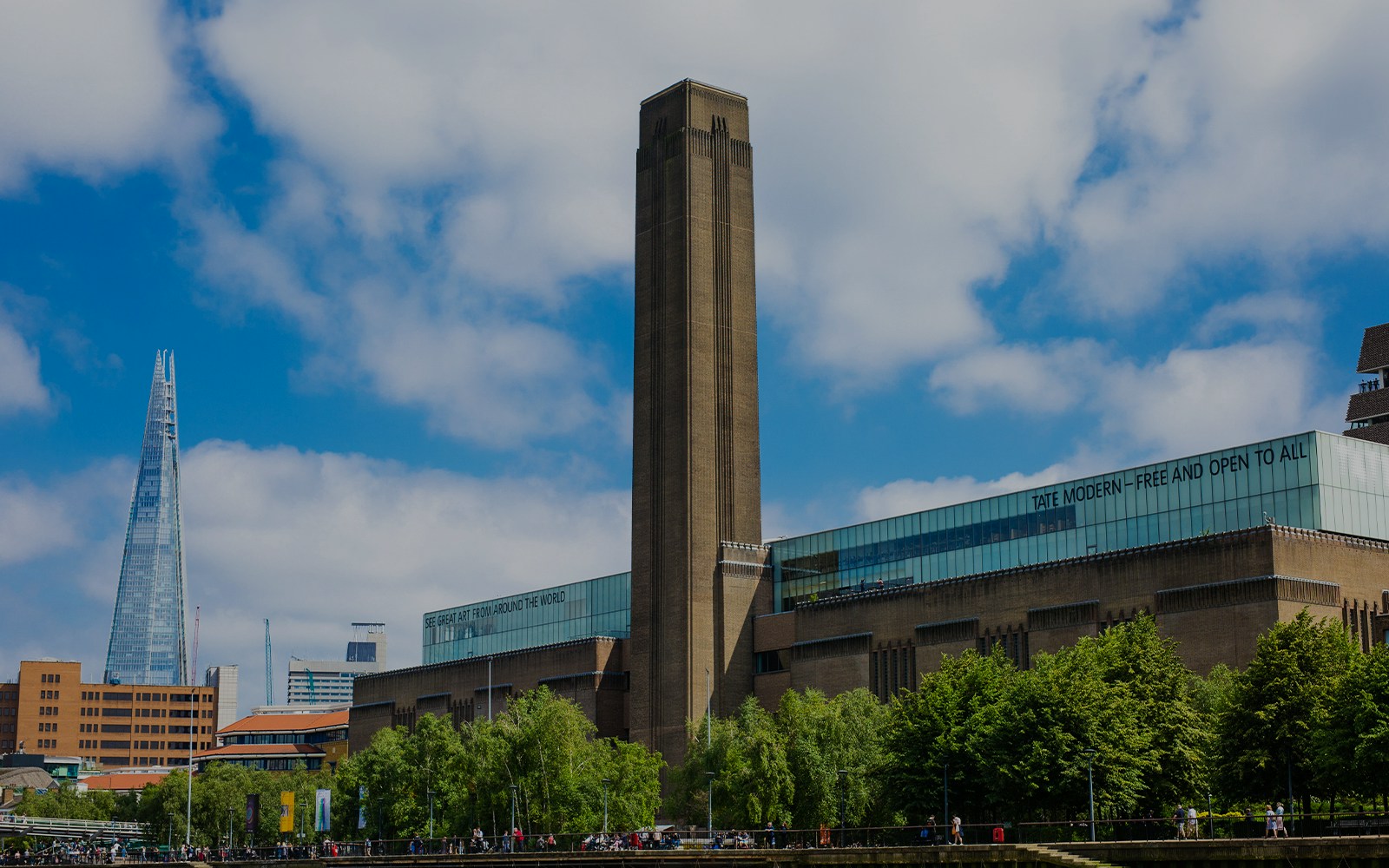 Tate Modern viewed from Thames sightseeing cruise in London.
