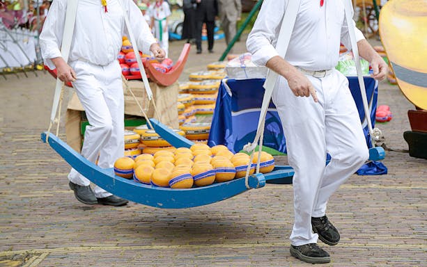 Windmills and traditional Dutch houses at Zaanse Schans on a full-day tour from Amsterdam.