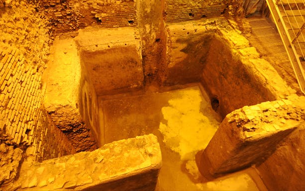 Trevi Underground ancient ruins in Rome, showcasing historical architecture.