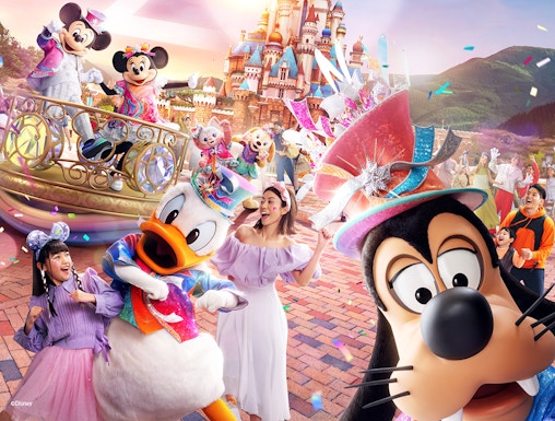 Disneyland Hong Kong 20th anniversary celebration with characters and castle.