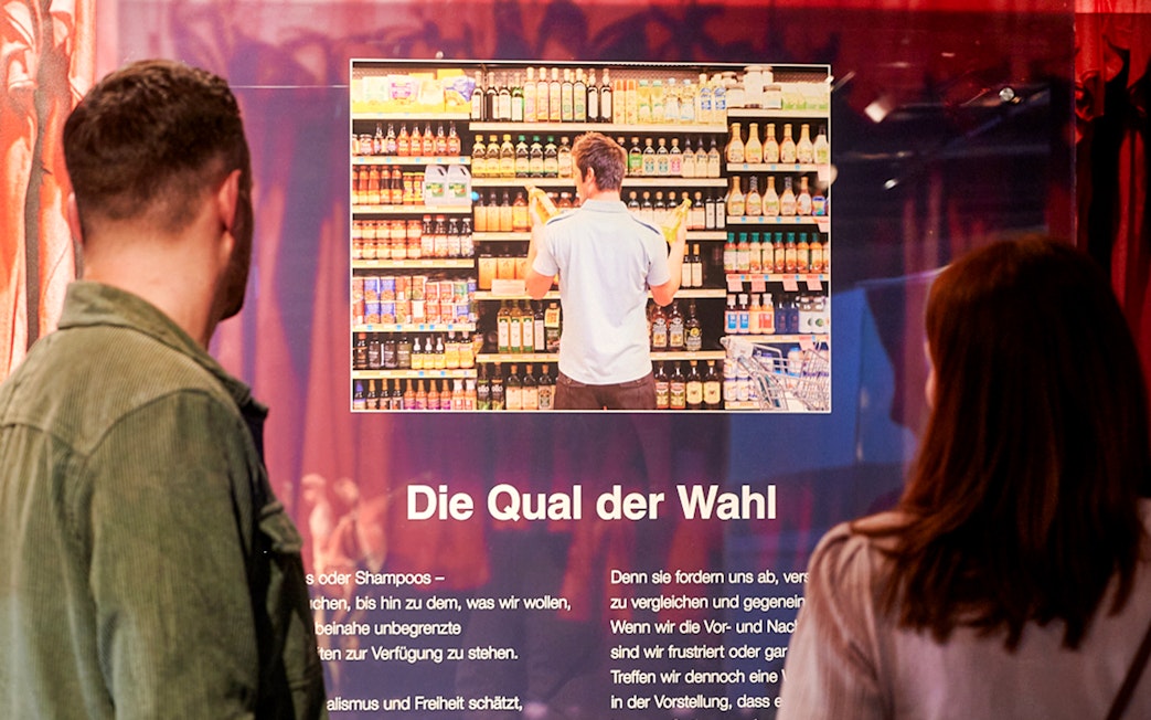 Visitors viewing an exhibit at Berlin BODY WORLDS Museum.