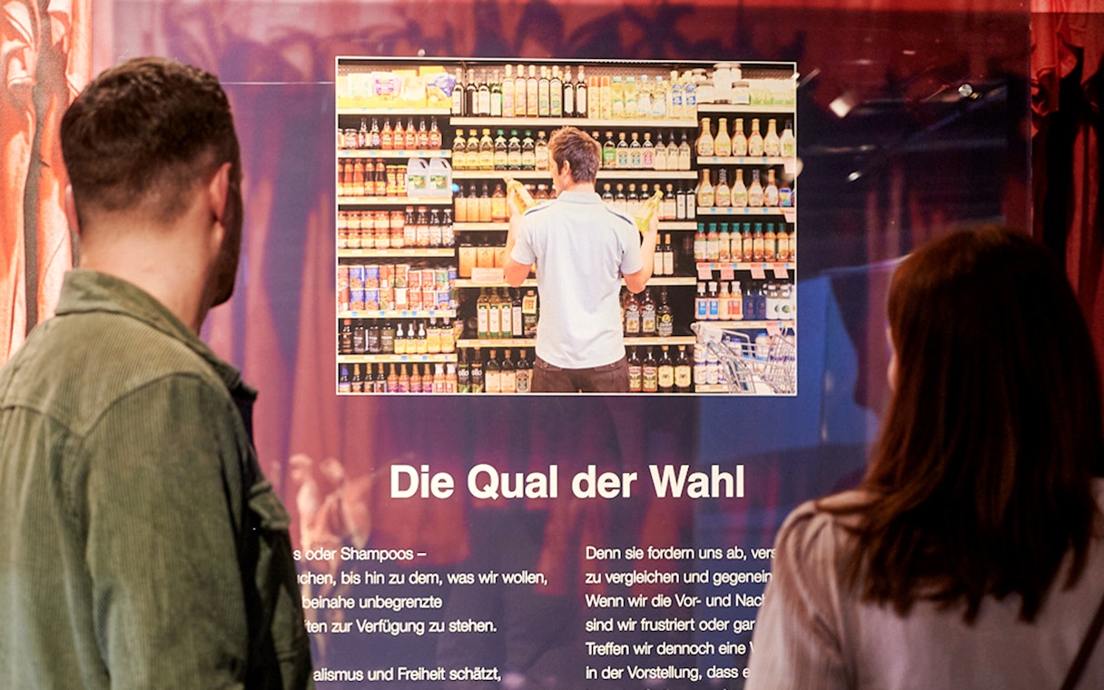 Visitors viewing an exhibit at Berlin BODY WORLDS Museum.