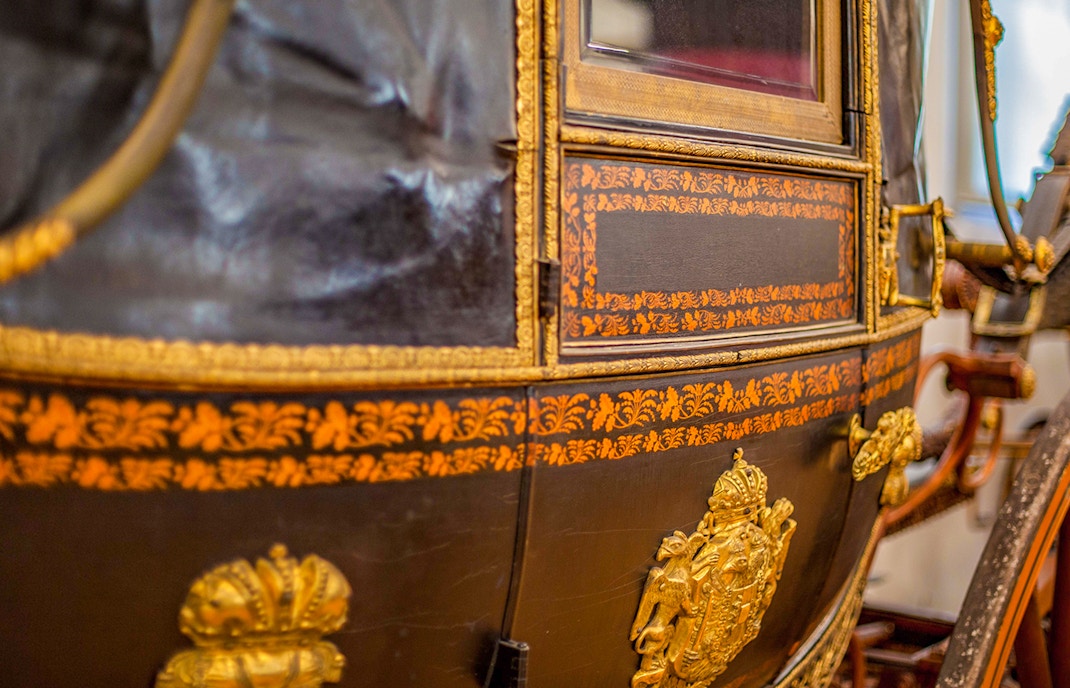 Design details on horse carriage at National Coach Museum, Lisbon.