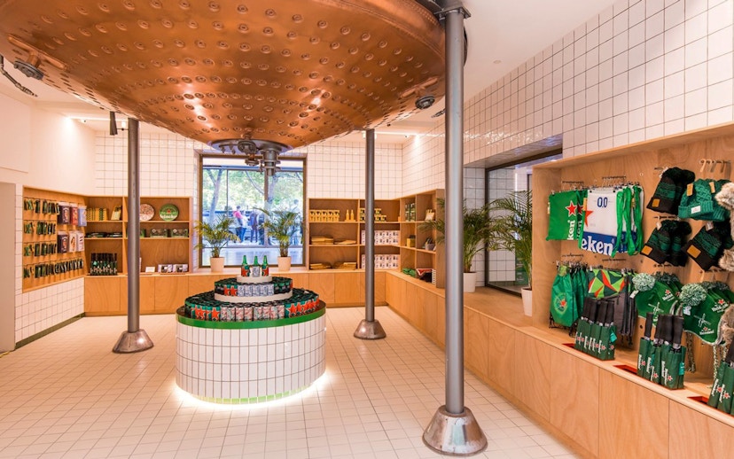 Heineken Store interior with merchandise display and branded items.