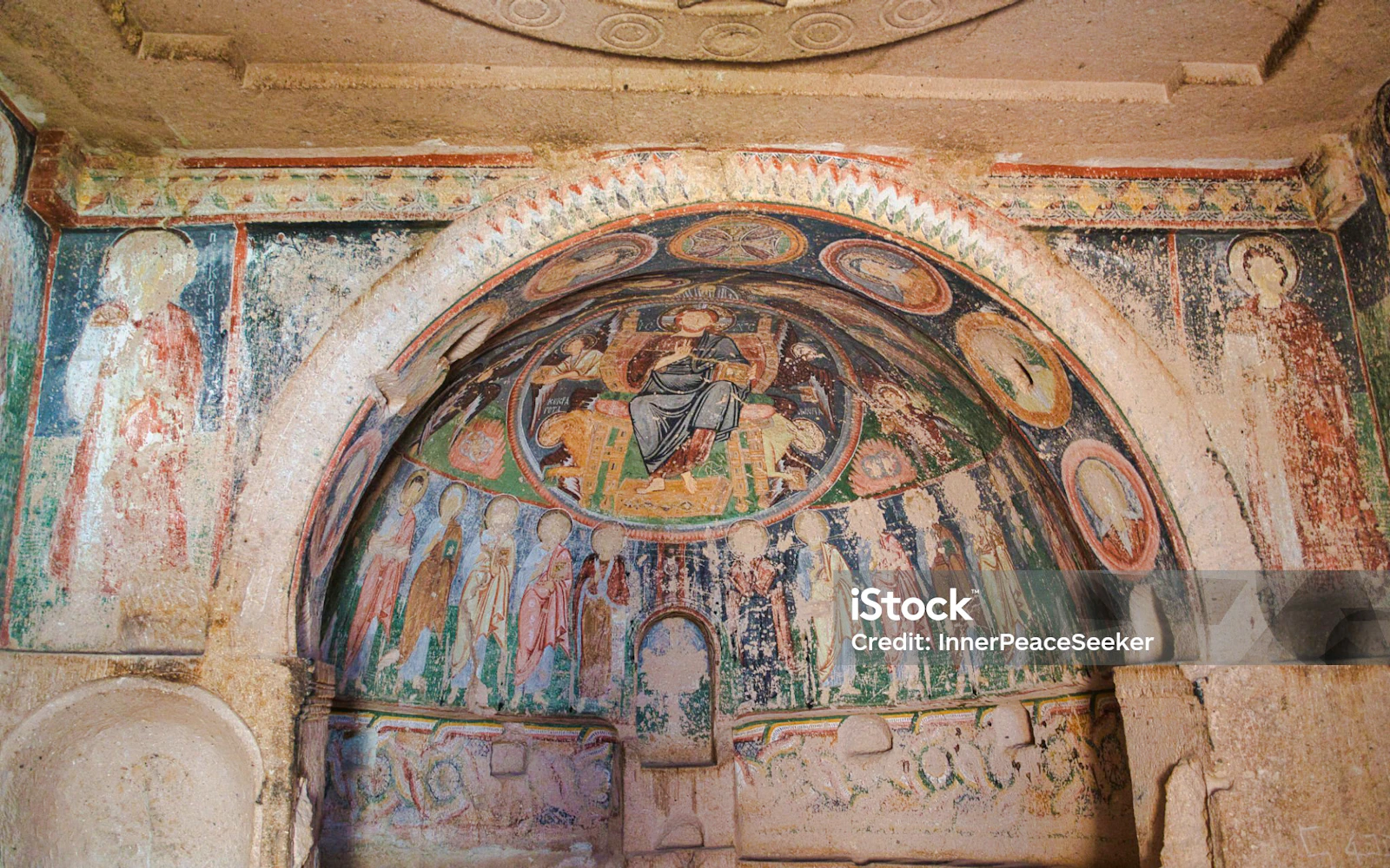 Ancient frescoes inside a Cappadocia cave church, part of the Guided Cappadocia Night Museum & Red Tour Experience.