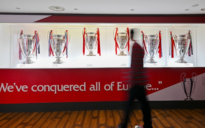 Liverpool FC's European trophies displayed at Anfield stadium.