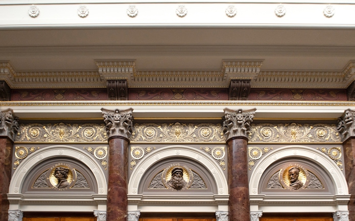Ornate architectural details inside the National Gallery, London, featuring decorative columns and reliefs.