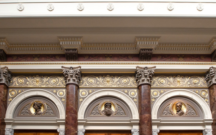 Ornate architectural details inside the National Gallery, London, featuring decorative columns and reliefs.