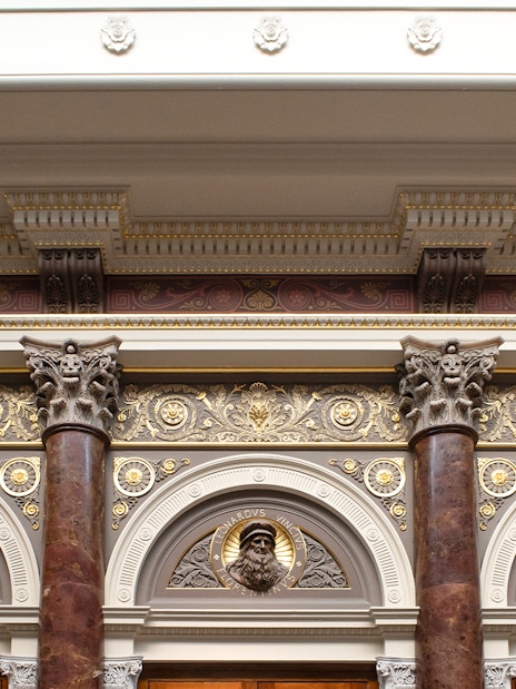 Ornate architectural details inside the National Gallery, London, featuring decorative columns and reliefs.