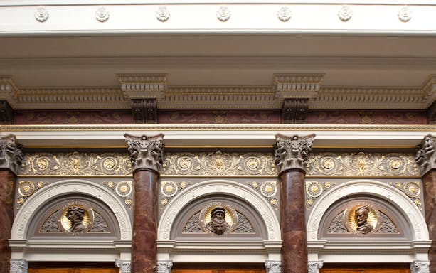 Ornate architectural details inside the National Gallery, London, featuring decorative columns and reliefs.