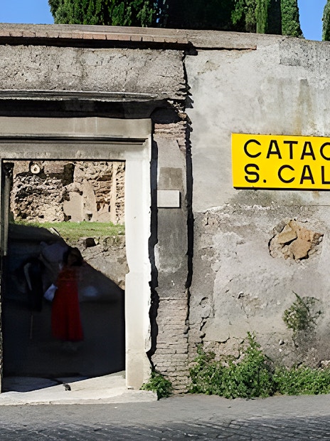 Tourists entering the Catacombs of St. Callixtus in Rome, Italy.