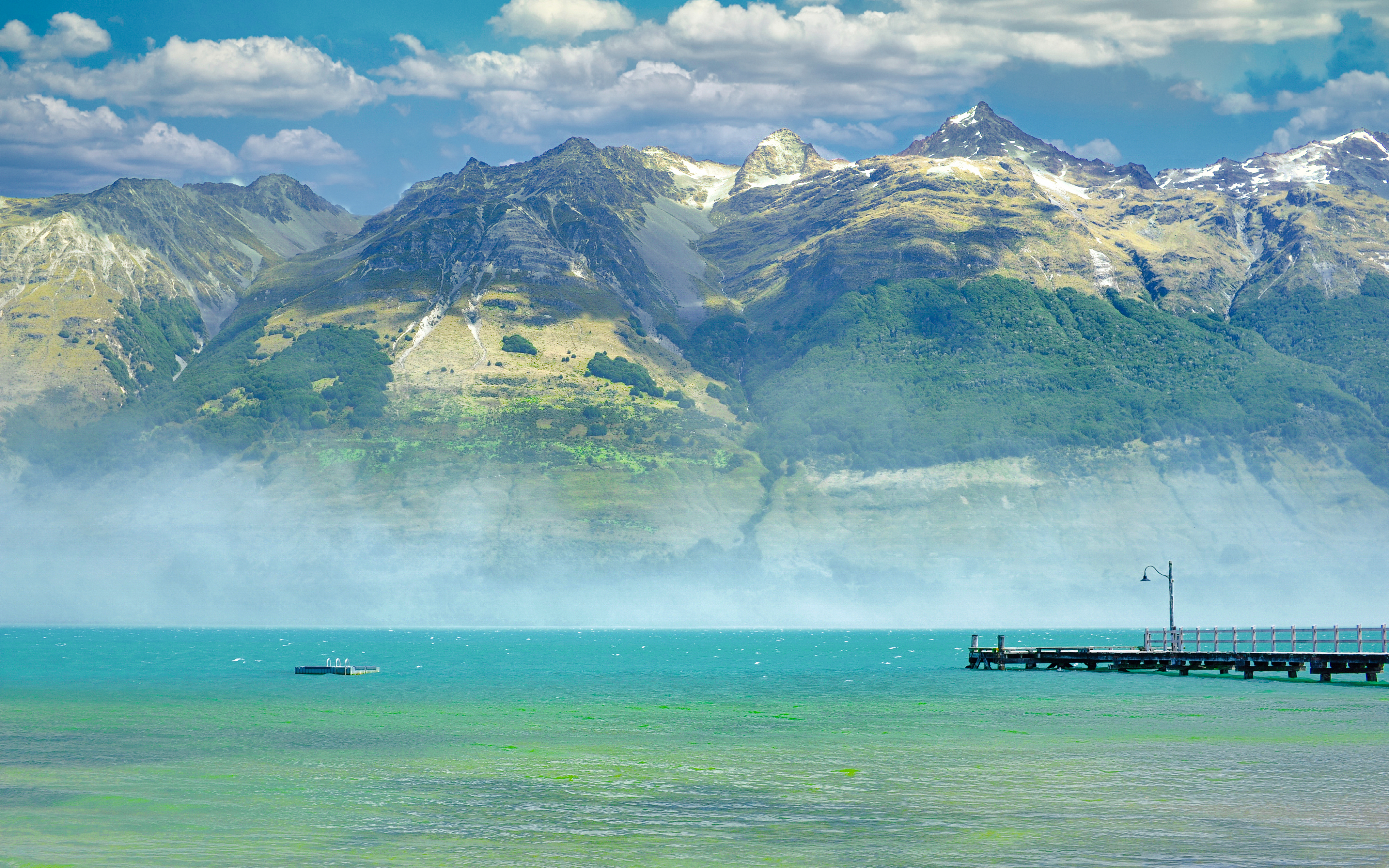 Lake Wakatipu with wharf and mountains near Glenorchy, Queenstown Bay.