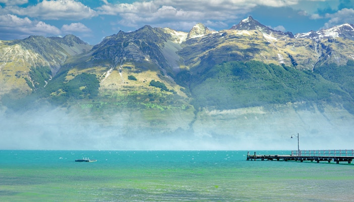 Lake Wakatipu with wharf and mountains near Glenorchy, Queenstown Bay.