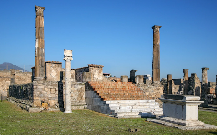 Temple of Apollo ruins with columns and altar, Pompeii, Italy.