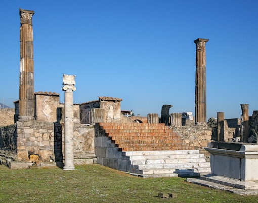 Temple of Apollo ruins with columns and altar, Pompeii, Italy.