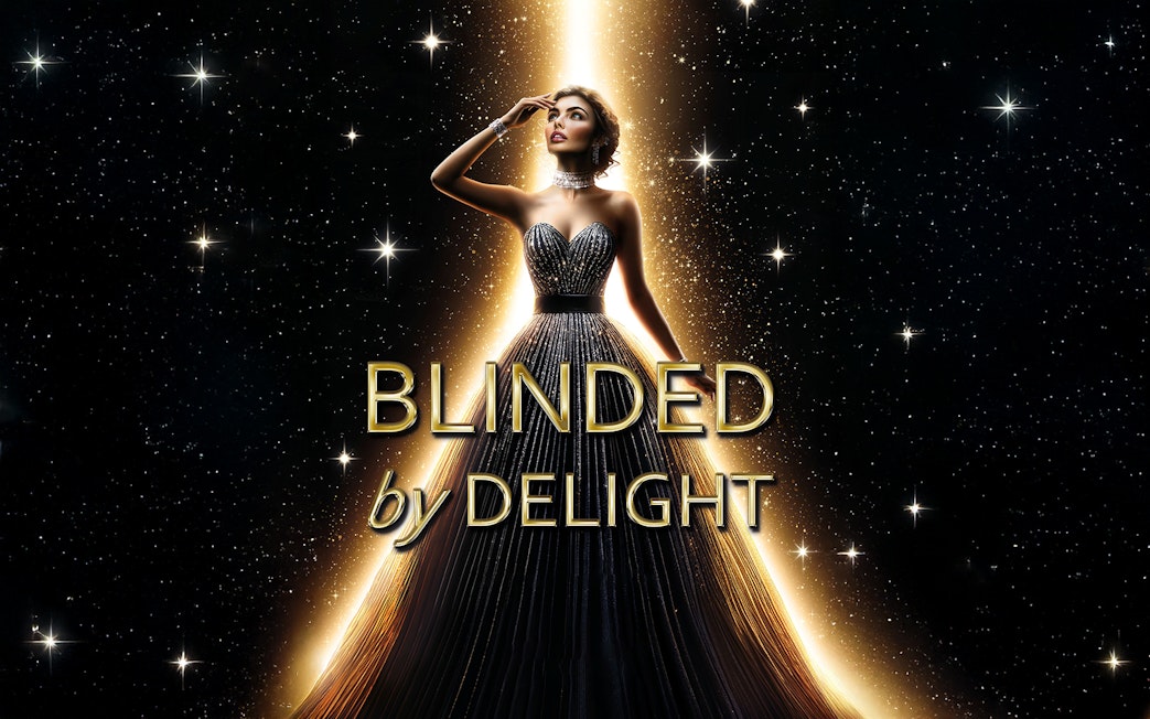 Performer in elegant gown under spotlight for BLINDED by DELIGHT Grand Show Berlin.