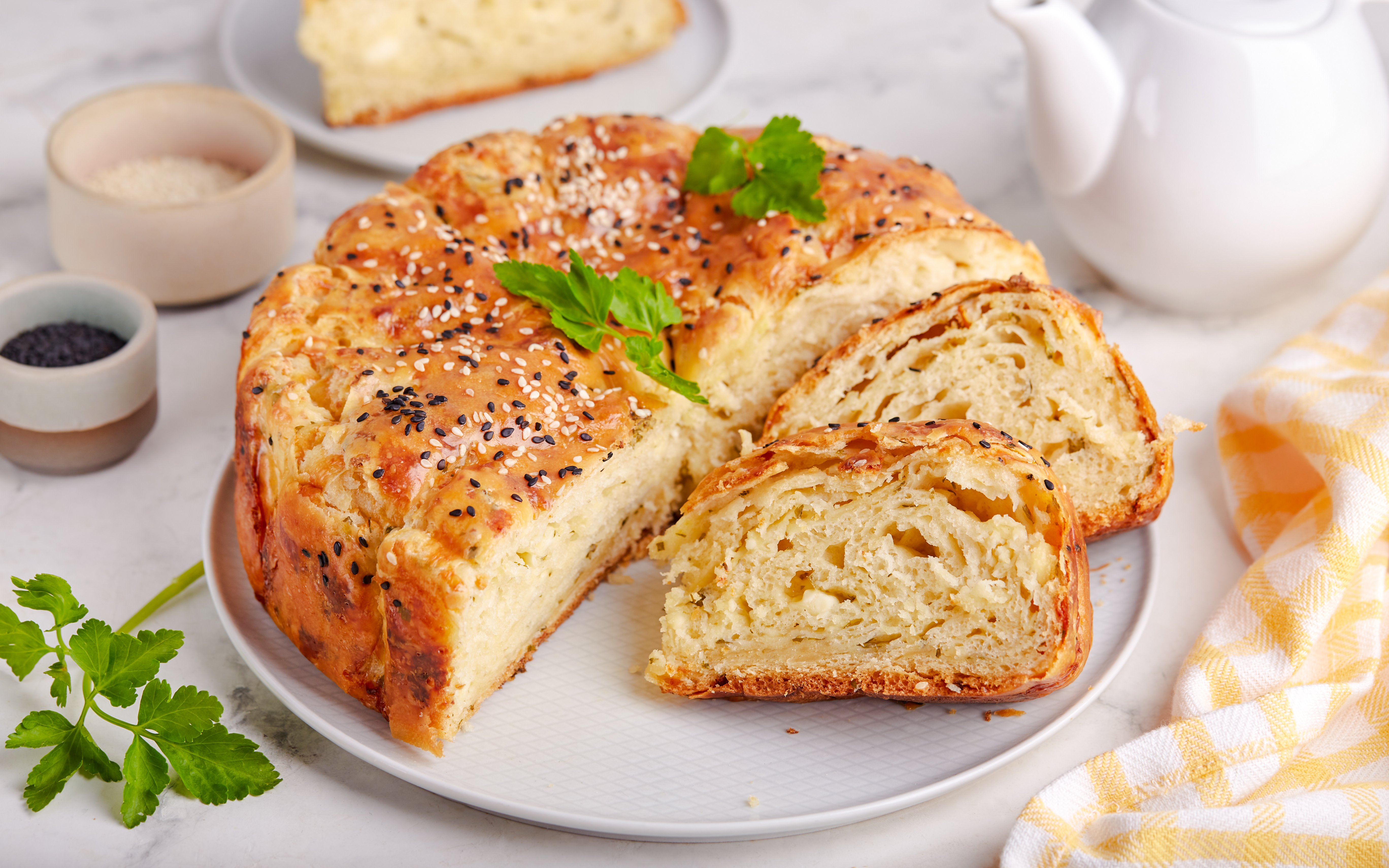 Feta bread with sesame crust served at Delphi Restaurant.