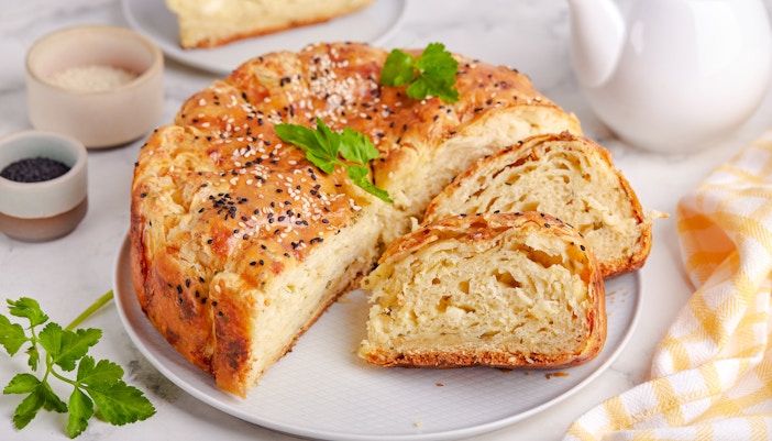 Feta bread with sesame crust served at Delphi Restaurant.