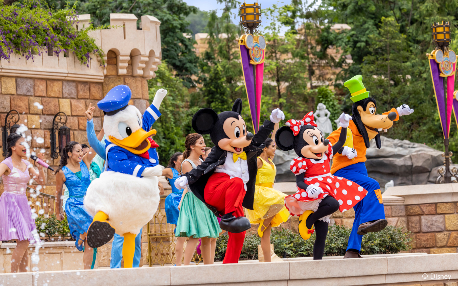 Disney characters performing at Disneyland Hong Kong.
