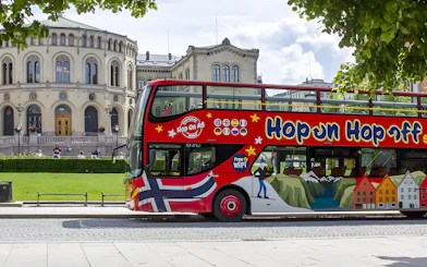 Hop on Hop off bus in front of Storting building, Oslo.