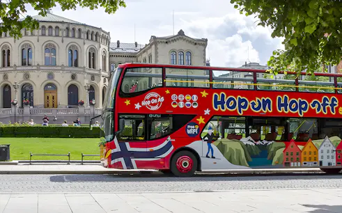 Hop on Hop off bus in front of Storting building, Oslo.