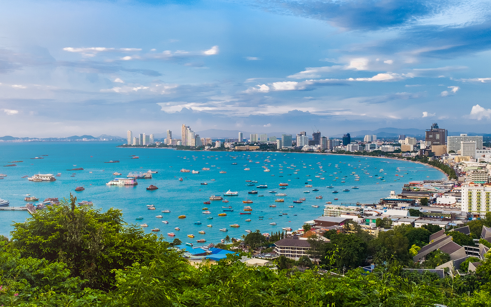 Panoramic view of Pattaya cityscape from Chonburi viewpoint, Thailand, showcasing coastal skyline.