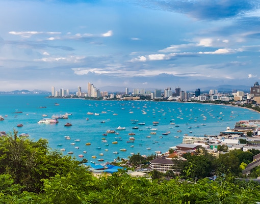 Panoramic view of Pattaya cityscape from Chonburi viewpoint, Thailand, showcasing coastal skyline.