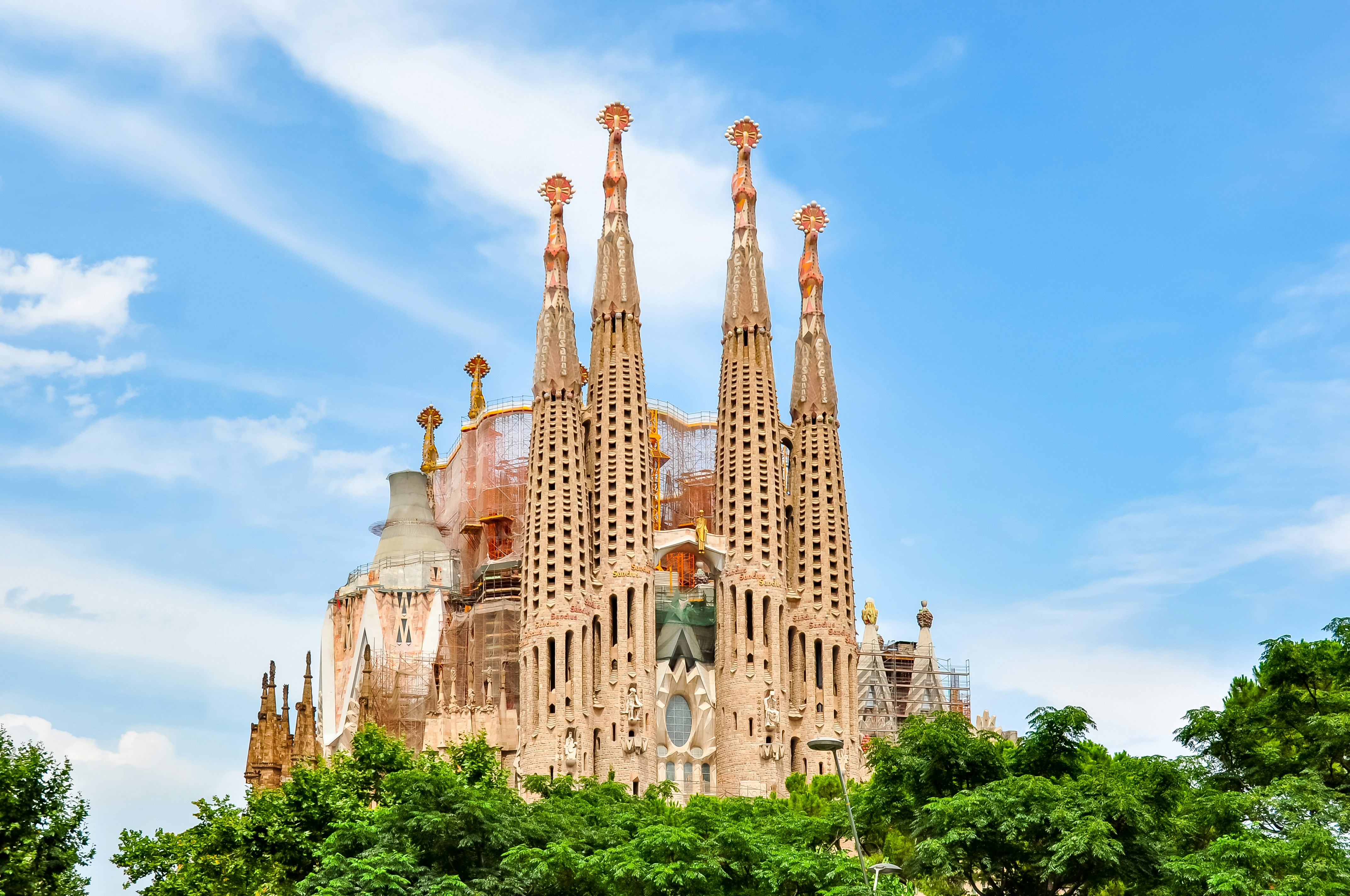 Facade of Sagrada Familia in Barcelona with intricate architectural details.