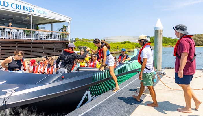 Passengers boarding the Arro Jet Boat at Gold Coast dock.