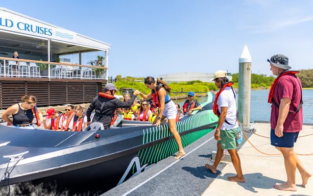 Passengers boarding the Arro Jet Boat at Gold Coast dock.