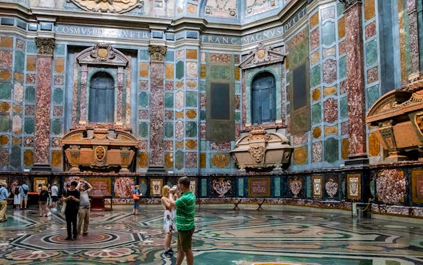 Medici Chapel crypts in Florence with visitors, part of Florence Wonders tour with Uffizi Gallery access.