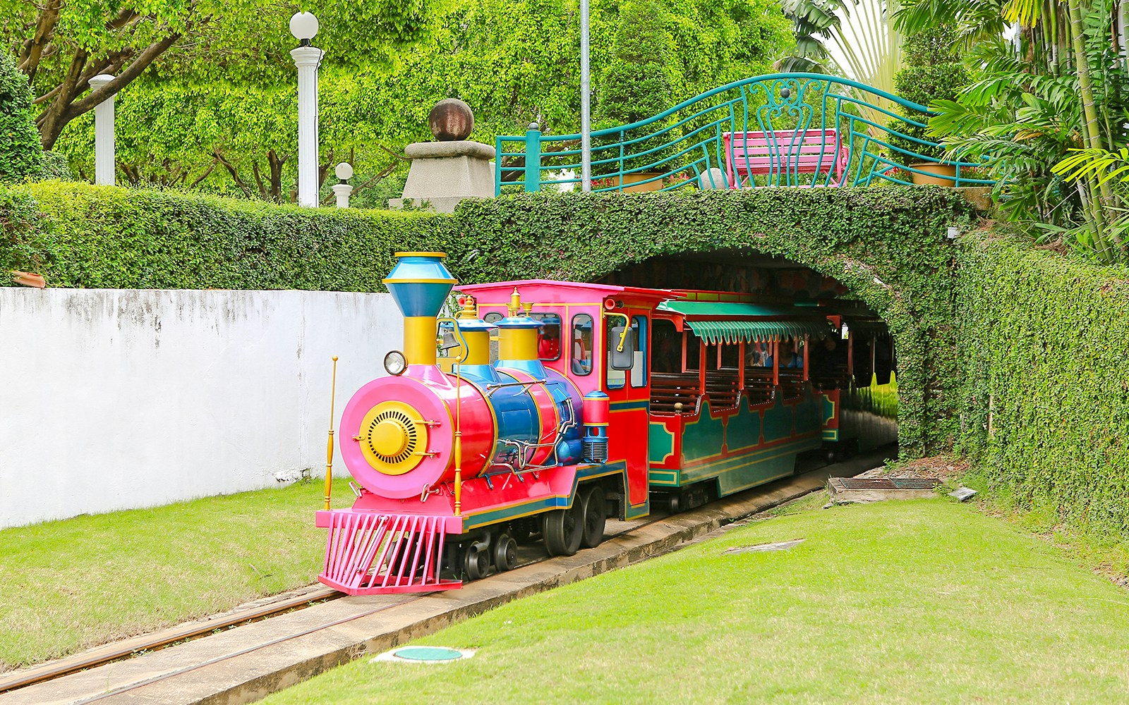 Toy train emerging from a tunnel at Dreamworld Bangkok.