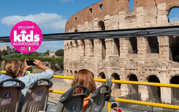 Hop-on hop-off bus near Colosseum in Rome with kids' audio guide.
