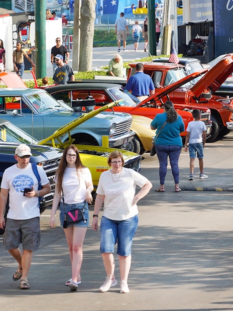 Crowd enjoying classic car show at Old Town, Orlando.