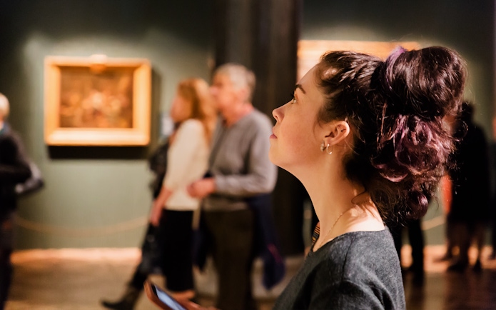 Person observing artwork in a Barcelona museum.