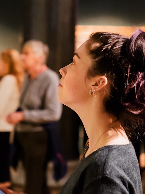 Person observing artwork in a Barcelona museum.