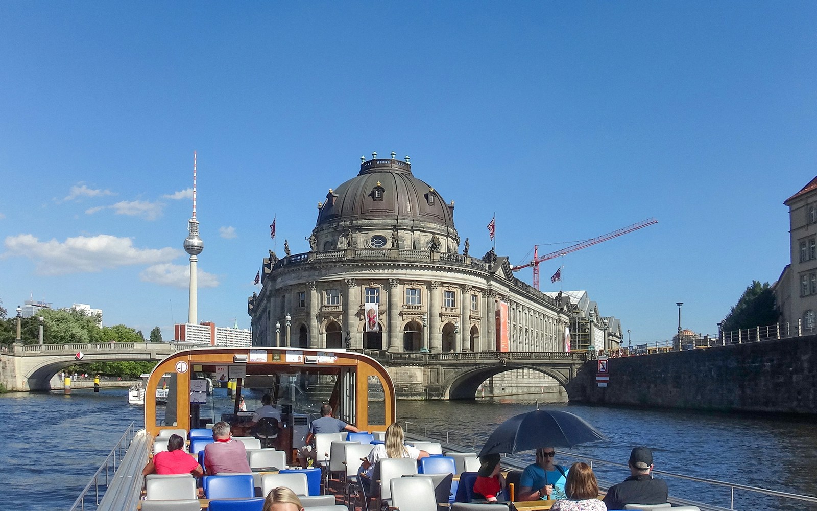 Berlin sightseeing cruise with view of Bode Museum and TV Tower from Hackescher Markt.