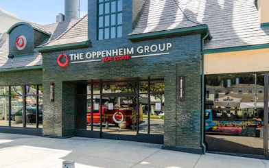 The Oppenheim Group Real Estate office entrance in Los Angeles.