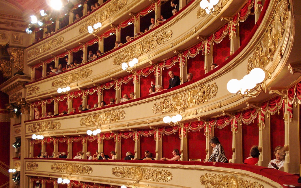 La Scala Theater balconies with ornate gold details during skip-the-line guided tour.