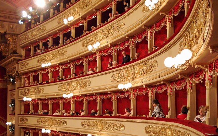 La Scala Theater balconies with ornate gold details during skip-the-line guided tour.