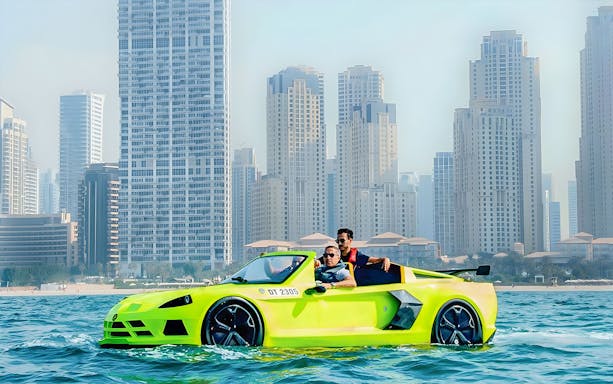 Jet car on water with Dubai skyline in the background.