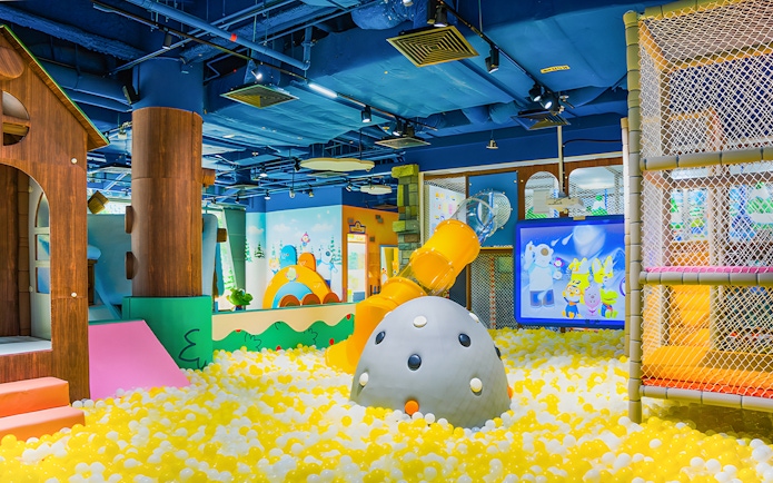 Indoor playground with slides and ball pit at Pororo Park Singapore.