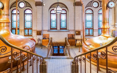 Copper brewing kettles inside the Heineken Experience in Amsterdam.