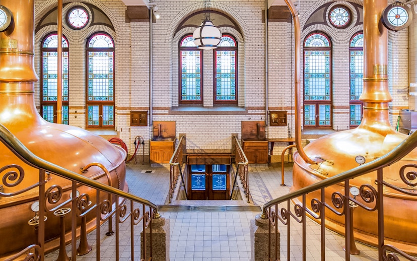 Copper brewing kettles inside the Heineken Experience in Amsterdam.